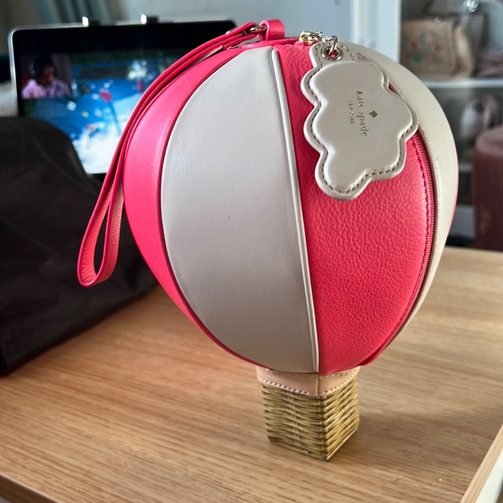 Kate Spade New York Hot Air Balloon clutch with strap.